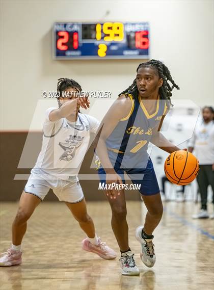 Thumbnail 3 in New Life Christian Academy vs. James Cardinal McGuigan (Veterans Showcase) photogallery.