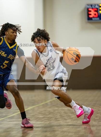 Thumbnail 2 in New Life Christian Academy vs. James Cardinal McGuigan (Veterans Showcase) photogallery.