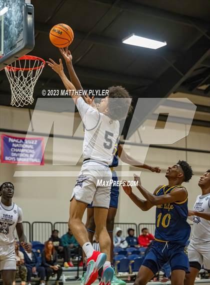 Thumbnail 3 in New Life Christian Academy vs. James Cardinal McGuigan (Veterans Showcase) photogallery.