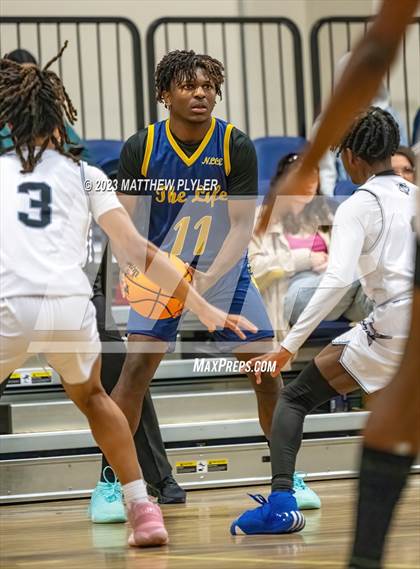 Thumbnail 3 in New Life Christian Academy vs. James Cardinal McGuigan (Veterans Showcase) photogallery.