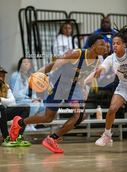 Thumbnail 2 in New Life Christian Academy vs. James Cardinal McGuigan (Veterans Showcase) photogallery.