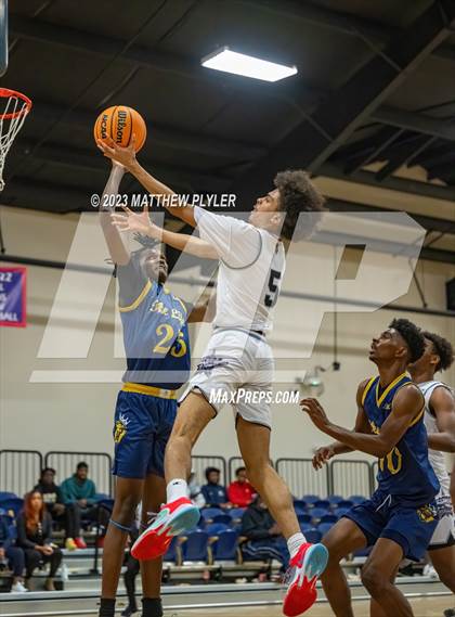 Thumbnail 1 in New Life Christian Academy vs. James Cardinal McGuigan (Veterans Showcase) photogallery.