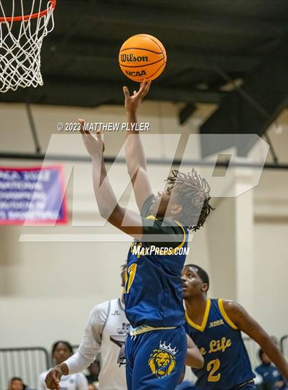 Thumbnail 3 in New Life Christian Academy vs. James Cardinal McGuigan (Veterans Showcase) photogallery.