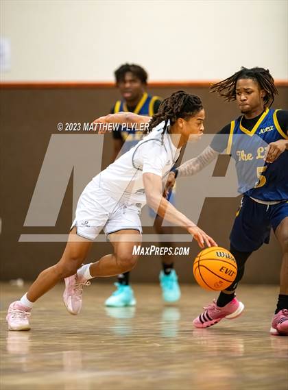 Thumbnail 3 in New Life Christian Academy vs. James Cardinal McGuigan (Veterans Showcase) photogallery.