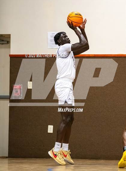 Thumbnail 2 in New Life Christian Academy vs. James Cardinal McGuigan (Veterans Showcase) photogallery.