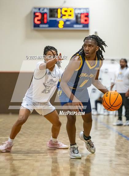 Thumbnail 2 in New Life Christian Academy vs. James Cardinal McGuigan (Veterans Showcase) photogallery.