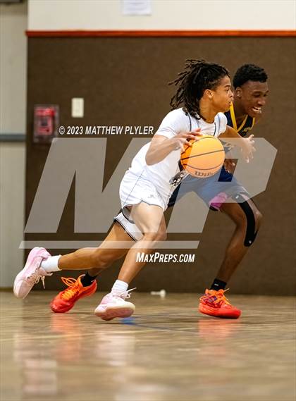 Thumbnail 3 in New Life Christian Academy vs. James Cardinal McGuigan (Veterans Showcase) photogallery.