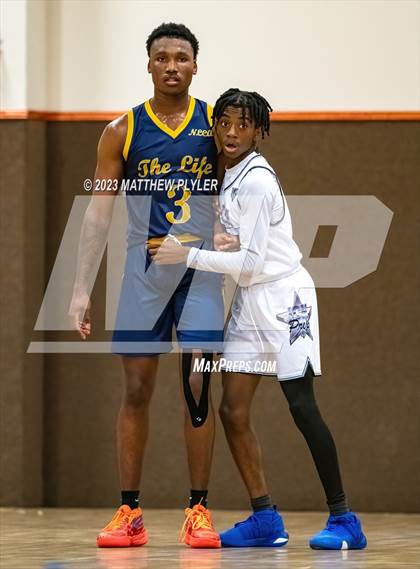 Thumbnail 2 in New Life Christian Academy vs. James Cardinal McGuigan (Veterans Showcase) photogallery.