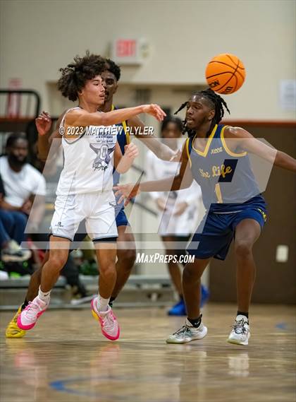 Thumbnail 1 in New Life Christian Academy vs. James Cardinal McGuigan (Veterans Showcase) photogallery.