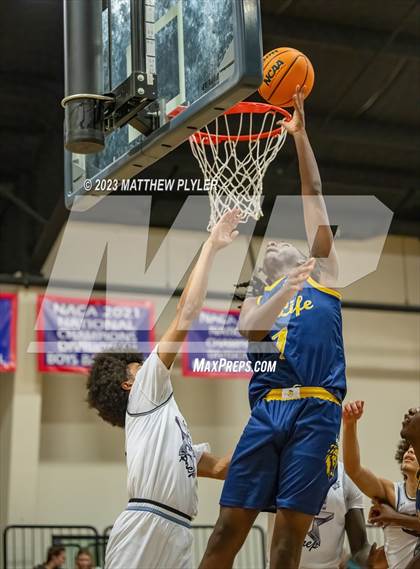 Thumbnail 3 in New Life Christian Academy vs. James Cardinal McGuigan (Veterans Showcase) photogallery.