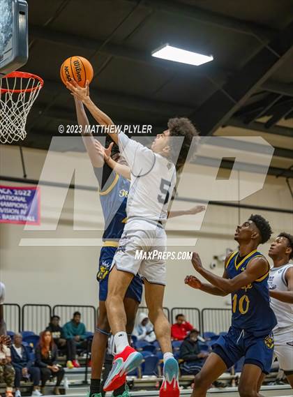 Thumbnail 2 in New Life Christian Academy vs. James Cardinal McGuigan (Veterans Showcase) photogallery.