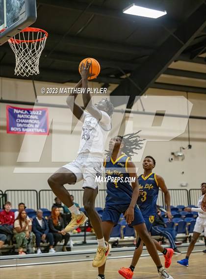 Thumbnail 2 in New Life Christian Academy vs. James Cardinal McGuigan (Veterans Showcase) photogallery.