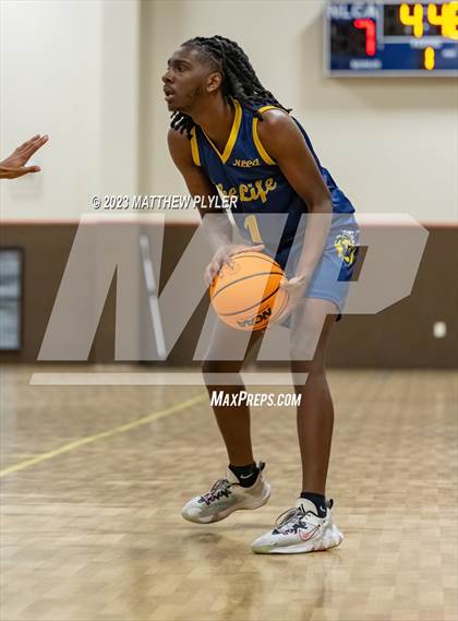 Thumbnail 2 in New Life Christian Academy vs. James Cardinal McGuigan (Veterans Showcase) photogallery.