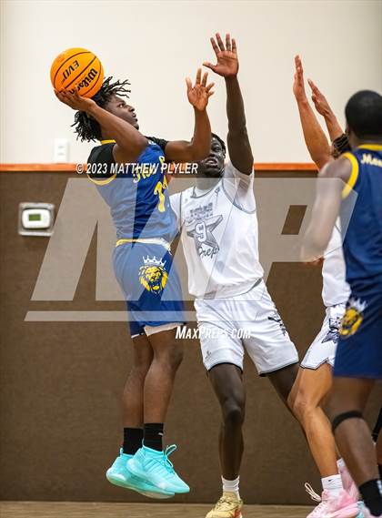 Thumbnail 3 in New Life Christian Academy vs. James Cardinal McGuigan (Veterans Showcase) photogallery.