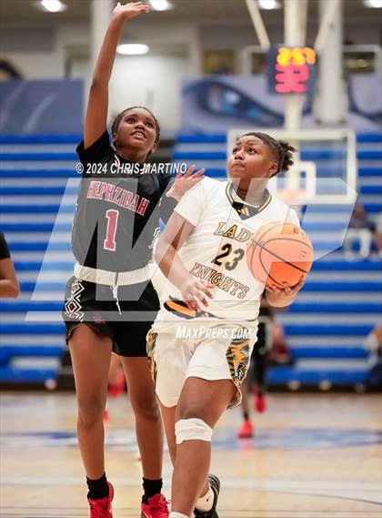 Thumbnail 3 in Hephzibah vs Evans (100 Black Men of Augusta Thanksgiving Classic) photogallery.