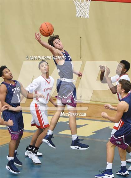 Thumbnail 1 in St. Thomas More vs John Curtis Christian (Country Day Holiday Tournament) photogallery.