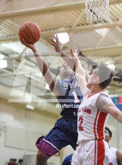 Thumbnail 3 in St. Thomas More vs John Curtis Christian (Country Day Holiday Tournament) photogallery.