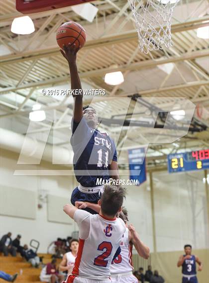 Thumbnail 1 in St. Thomas More vs John Curtis Christian (Country Day Holiday Tournament) photogallery.