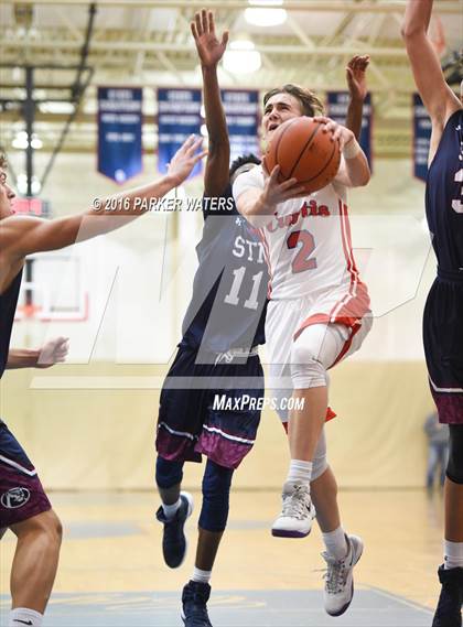Thumbnail 2 in St. Thomas More vs John Curtis Christian (Country Day Holiday Tournament) photogallery.