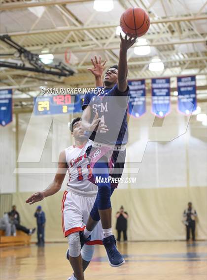 Thumbnail 2 in St. Thomas More vs John Curtis Christian (Country Day Holiday Tournament) photogallery.