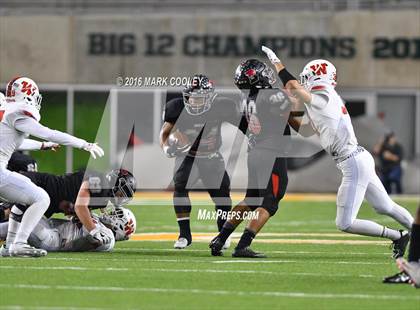 Thumbnail 1 in The Woodlands vs. Bowie (UIL 6A Regional Playoff) photogallery.