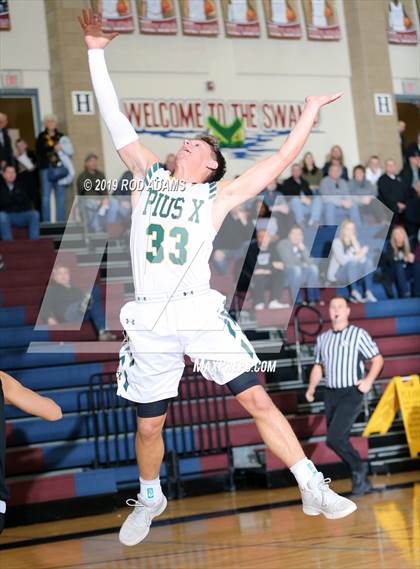 Thumbnail 1 in Pius X vs. Lincoln Northeast (HAC Tournament) photogallery.