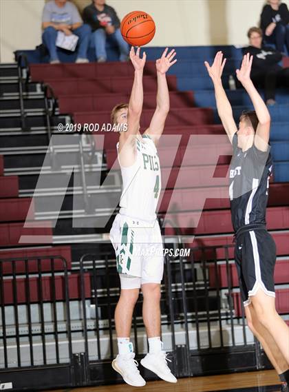 Thumbnail 3 in Pius X vs. Lincoln Northeast (HAC Tournament) photogallery.