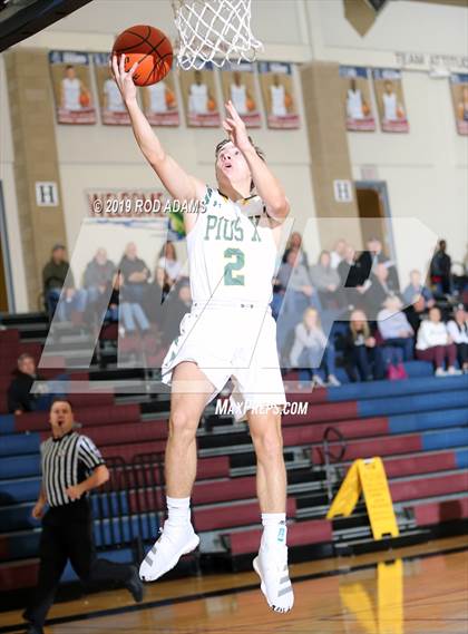 Thumbnail 3 in Pius X vs. Lincoln Northeast (HAC Tournament) photogallery.