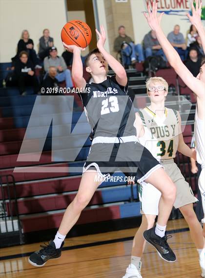 Thumbnail 1 in Pius X vs. Lincoln Northeast (HAC Tournament) photogallery.