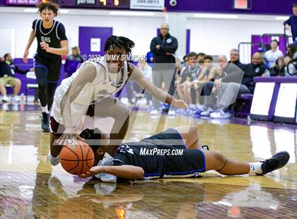 Thumbnail 3 in Quincy vs. Rockford East (Prairie Farms Holiday Classic) photogallery.
