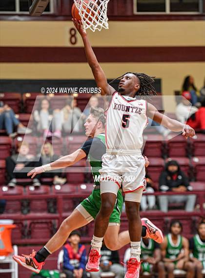 Thumbnail 2 in Kountze vs. Tatum (Holiday Hoops tournament) photogallery.