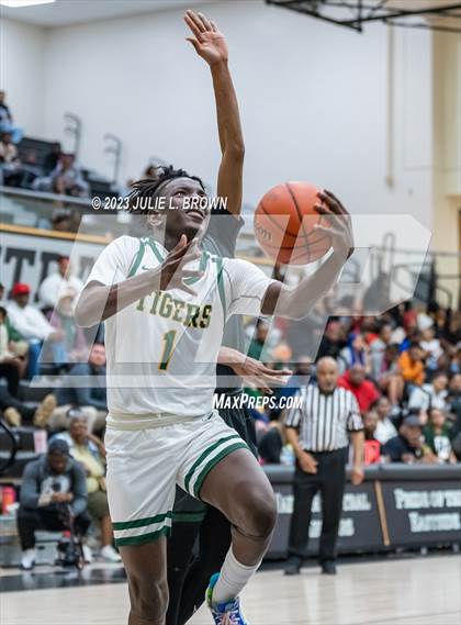 Thumbnail 2 in Indianapolis Crispus Attucks vs. Indianapolis Arsenal Technical (IHSAA 4A Sectional 10 First round) photogallery.