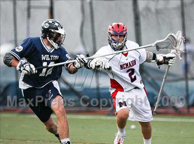 Wilton defender, Joe LaSala holds back the McMahon attack, but it wouldn't be enough in this highly