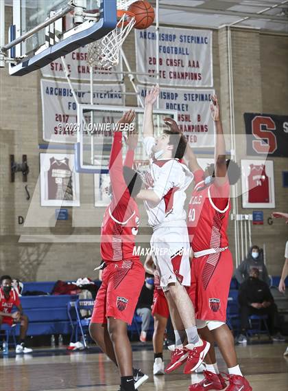 Thumbnail 1 in Moore Catholic vs LaSalle Academy (CHSAA Spring Tounament) photogallery.