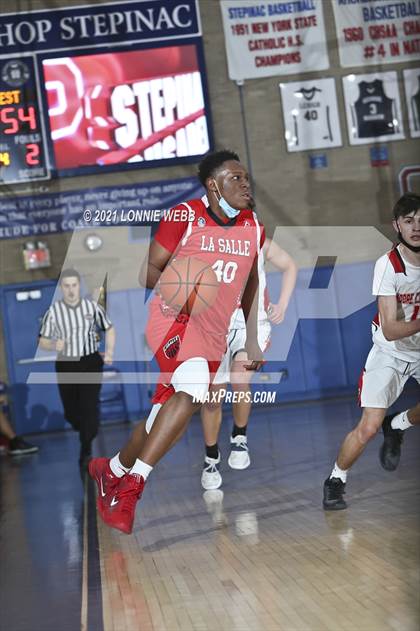 Thumbnail 2 in Moore Catholic vs LaSalle Academy (CHSAA Spring Tounament) photogallery.