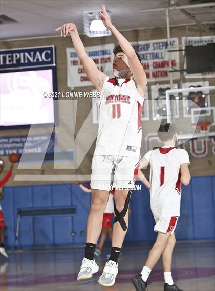 Thumbnail 2 in Moore Catholic vs LaSalle Academy (CHSAA Spring Tounament) photogallery.