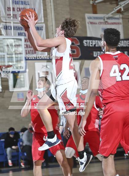 Thumbnail 3 in Moore Catholic vs LaSalle Academy (CHSAA Spring Tounament) photogallery.