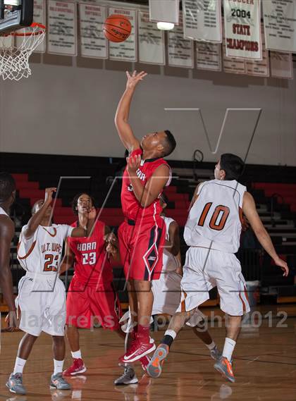 Thumbnail 2 in Horn [Dr. John] vs White [W.T.] (Carrollton-Farmers Branch Basketball Classic) photogallery.