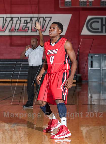 Thumbnail 2 in Horn [Dr. John] vs White [W.T.] (Carrollton-Farmers Branch Basketball Classic) photogallery.
