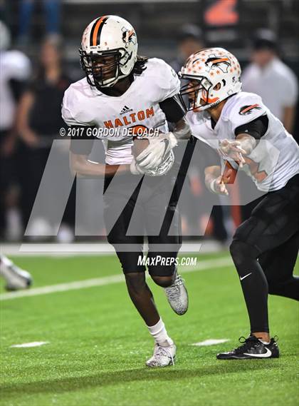 Thumbnail 1 in Lamar vs. Haltom (UIL 6A Bi-District Playoff) photogallery.