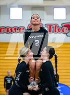 This MaxPreps.com professional photo is from the gallery Oak Ridge vs. Whitney (CIF SJS Div 1 Semifinals Stunt) which features Oak Ridge high school athletes playing  Cheer.