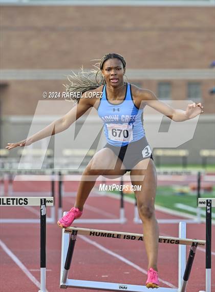 Thumbnail 1 in UIL Track & Field 6A Region 3 Regional Final Preliminaries (300 Meter Hurdles) photogallery.
