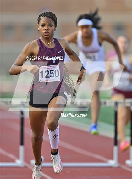 Thumbnail 1 in UIL Track & Field 6A Region 3 Regional Final Preliminaries (300 Meter Hurdles) photogallery.