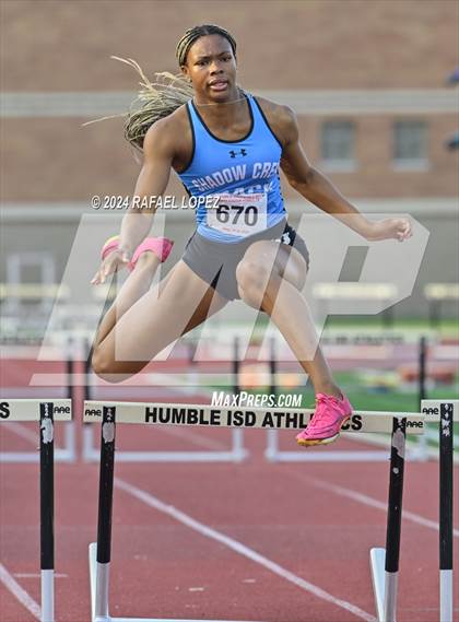 Thumbnail 1 in UIL Track & Field 6A Region 3 Regional Final Preliminaries (300 Meter Hurdles) photogallery.