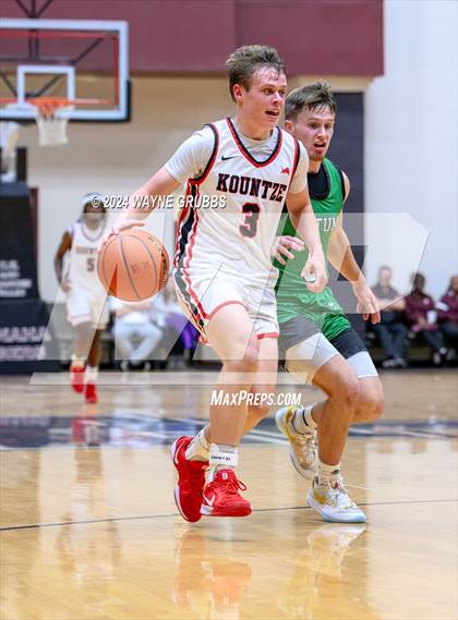 Thumbnail 2 in Kountze vs. Tatum (Tenaha Holiday Hoops) photogallery.