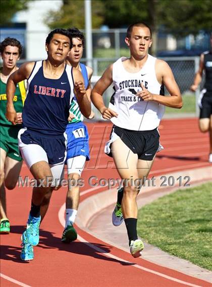Thumbnail 1 in Titan Top 9 Invitational (Boys 1600m Run) photogallery.