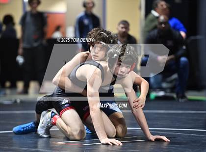 Thumbnail 1 in UIL Wrestling 5A-6A Finals (Round 1) photogallery.
