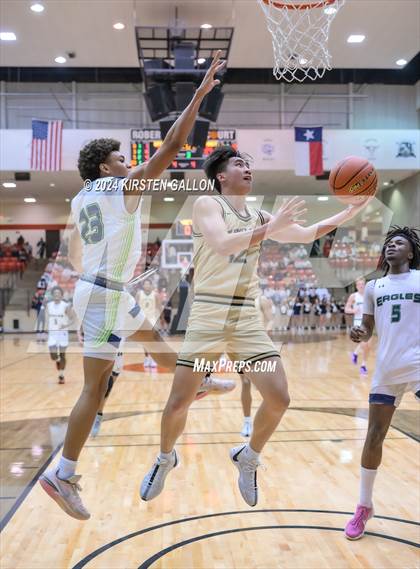 Thumbnail 1 in V.R. Eaton vs. Plano East (UIL Basketball 6A Area) photogallery.