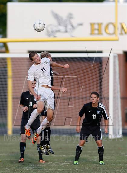 Thumbnail 2 in Washburn Rural vs St. James Academy (Gateway City Soccer Classic) photogallery.