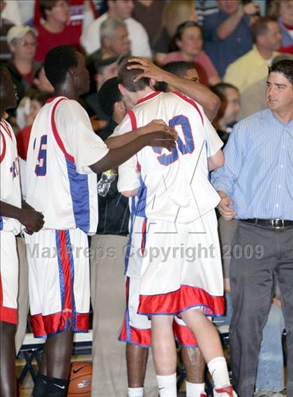 Thumbnail 1 in Trinity vs Manchester Memorial (NHIAA Class L Final) photogallery.